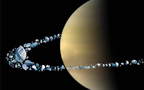 Artistieke weergave van de vernietiging van maan Chrysalis door Saturnus’ zwaartekrachtveld.
